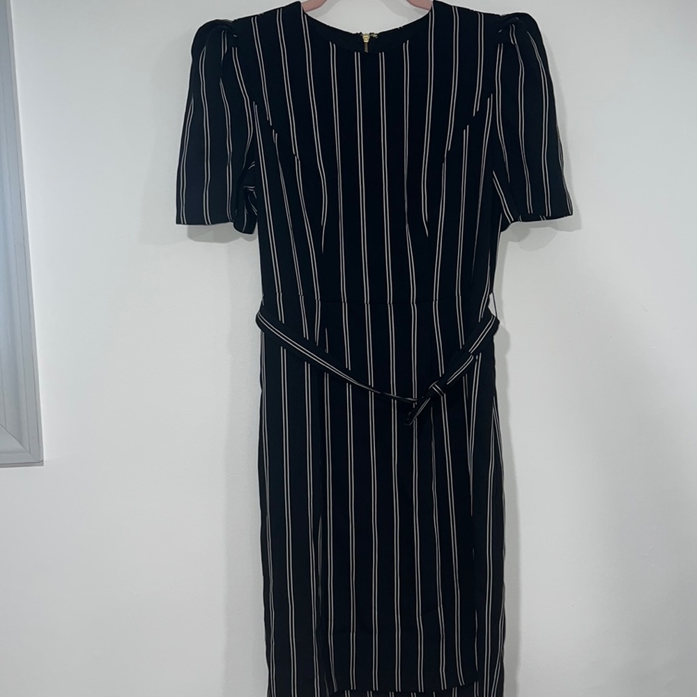 Express black and white strips ruffle shoulder sz 4